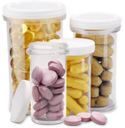 image of clear prescription bottles filled with medicine tablets and capsules